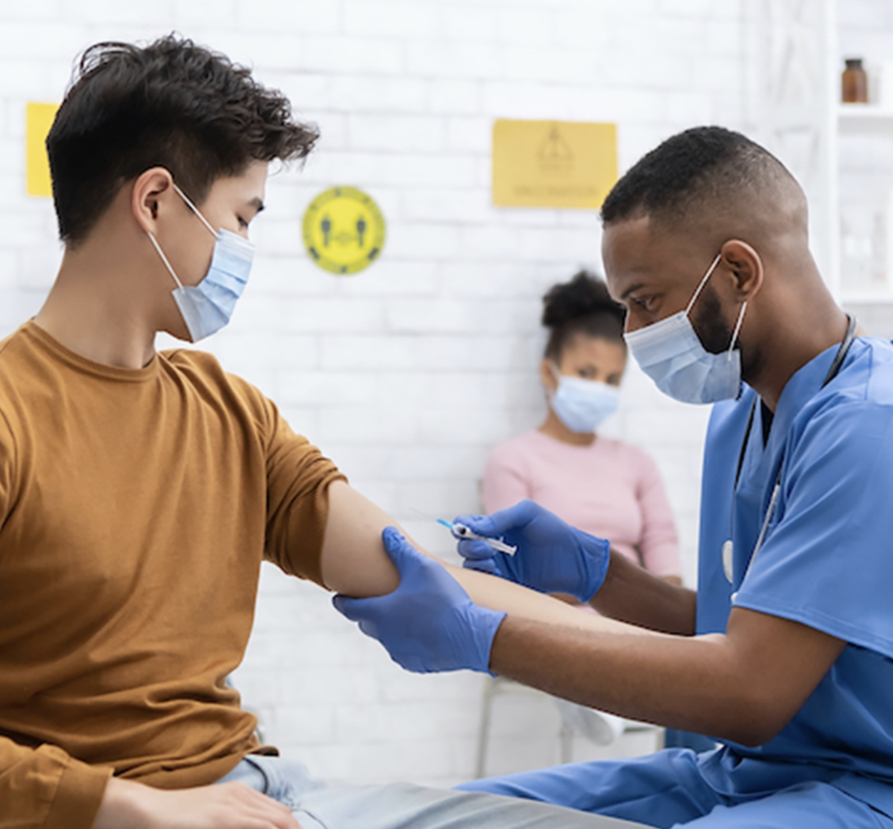 Image of healthcare provider giving vaccination