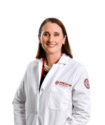 woman in a white coat