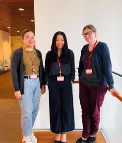 three people standing together